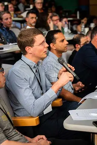 David Huston asking a question at the Cambridge LLM x Law Hackathon